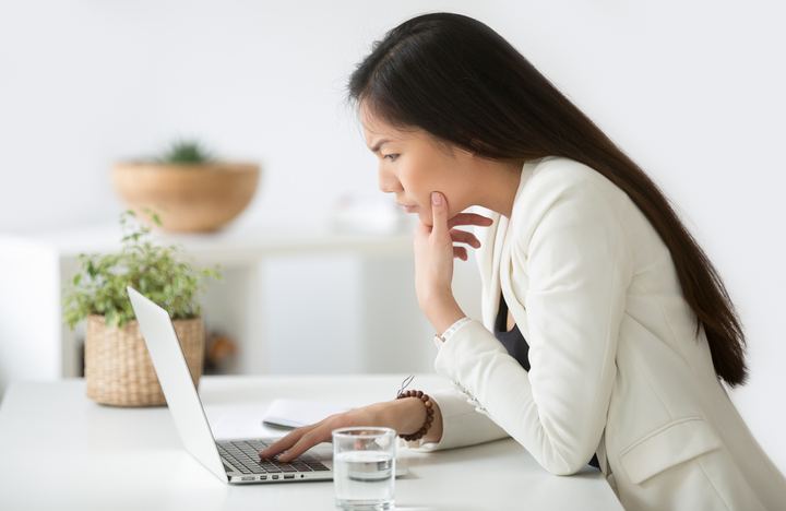 Businesswoman doing her business research