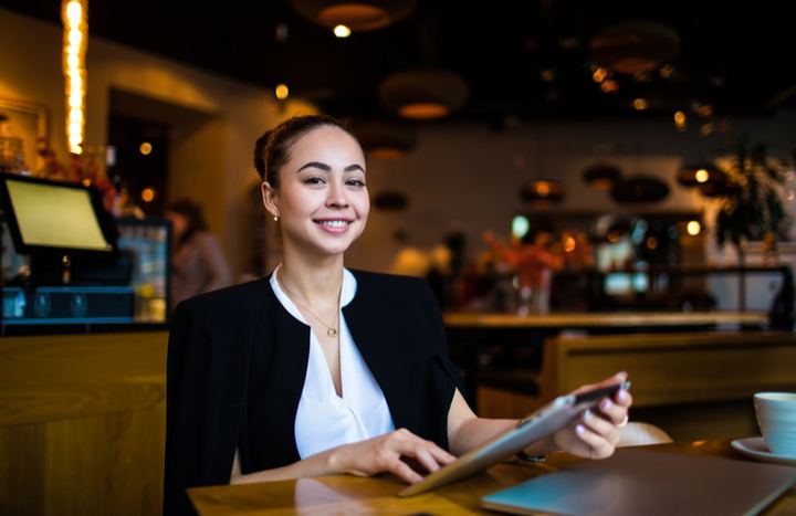 Restaurant owner managing her business social media