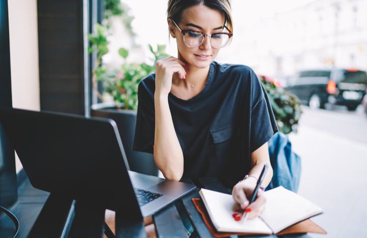 Woman taking notes