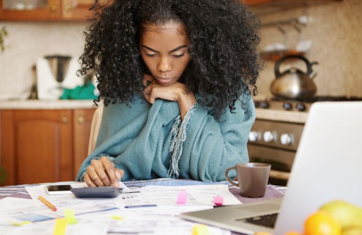 Woman business owner doing her finances