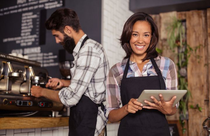 Restaurant Business workers using digital tools in a tablet