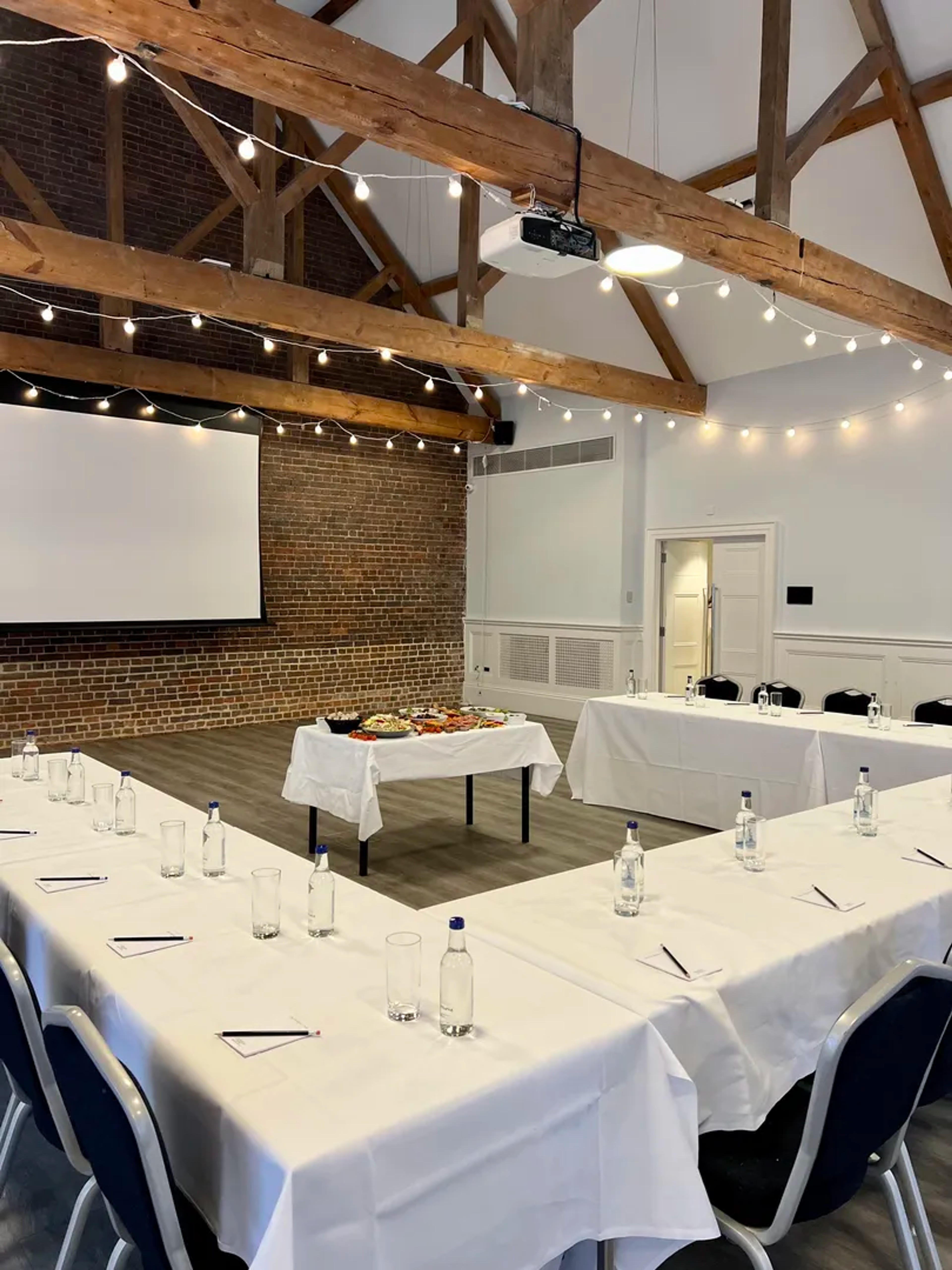 Conference setup with projector screen