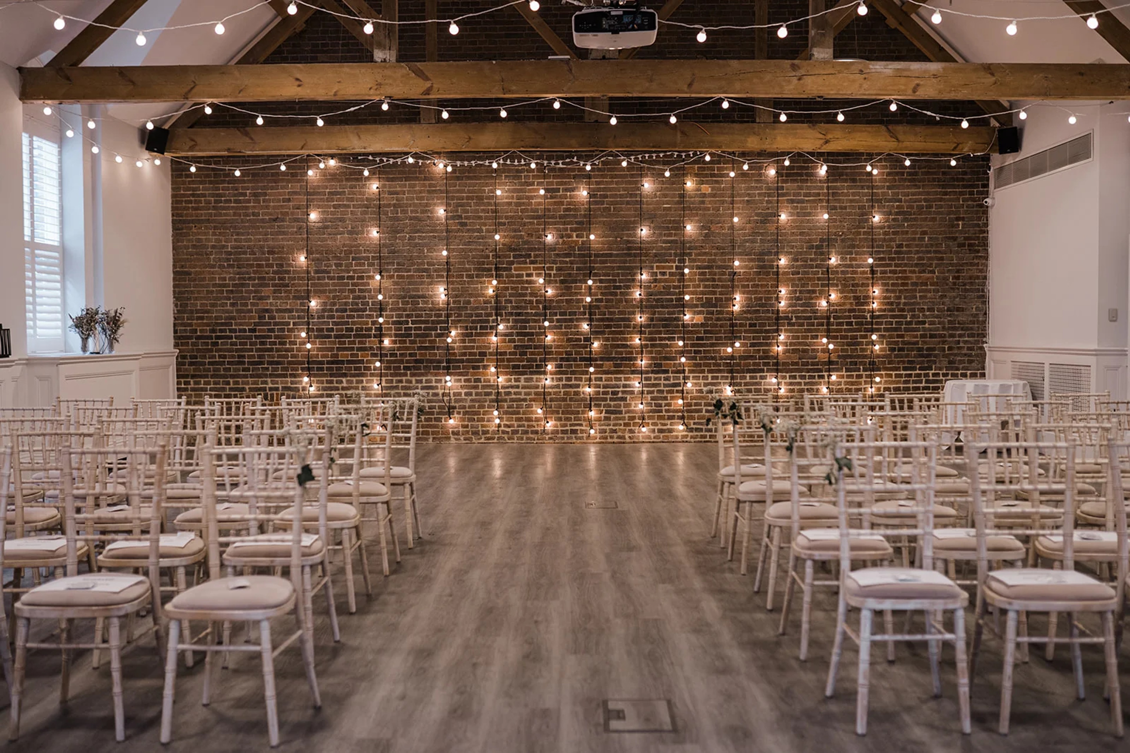 Couple exchanging vows in the ceremony room