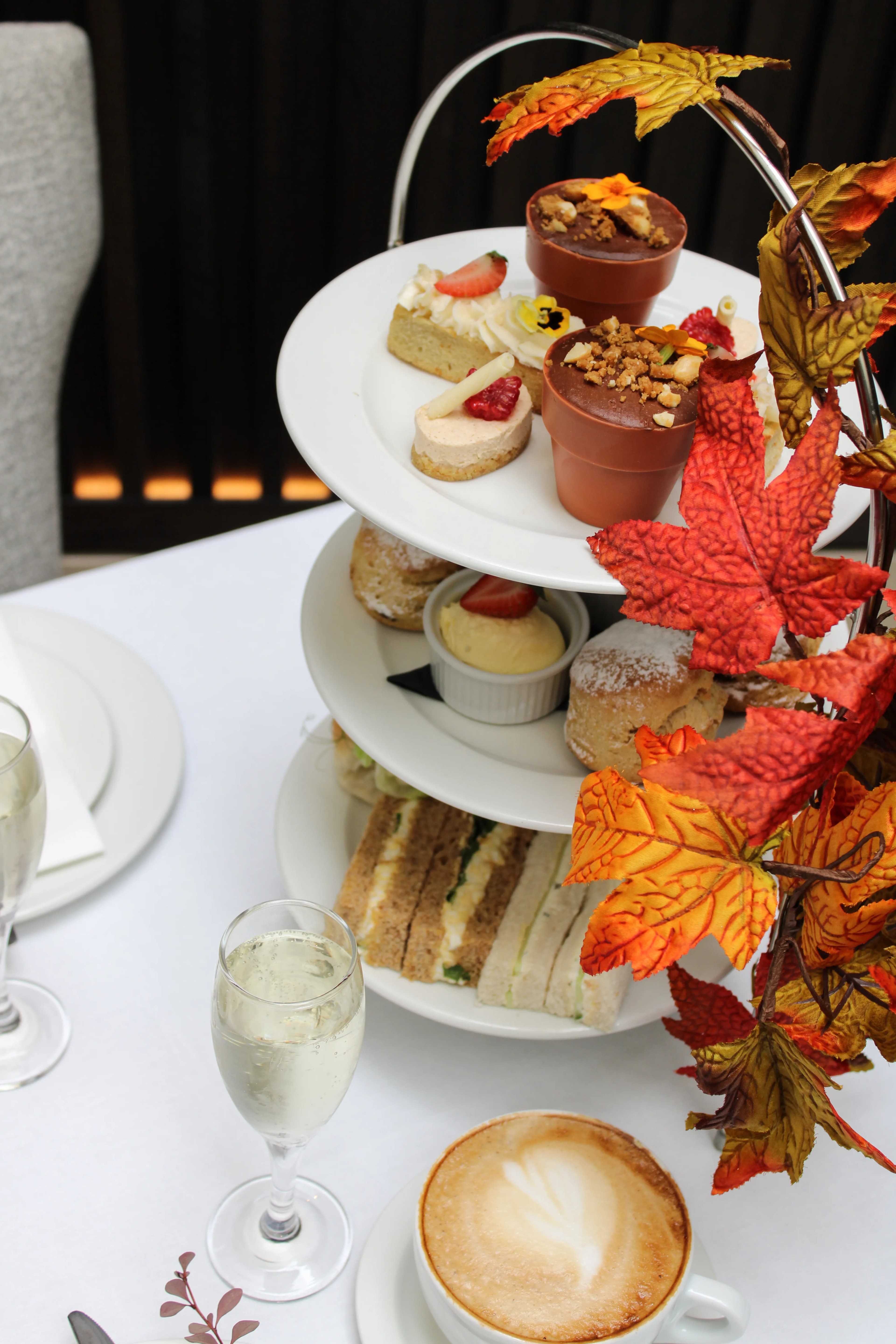 Close-up of autumn afternoon tea patisserie and seasonal cakes