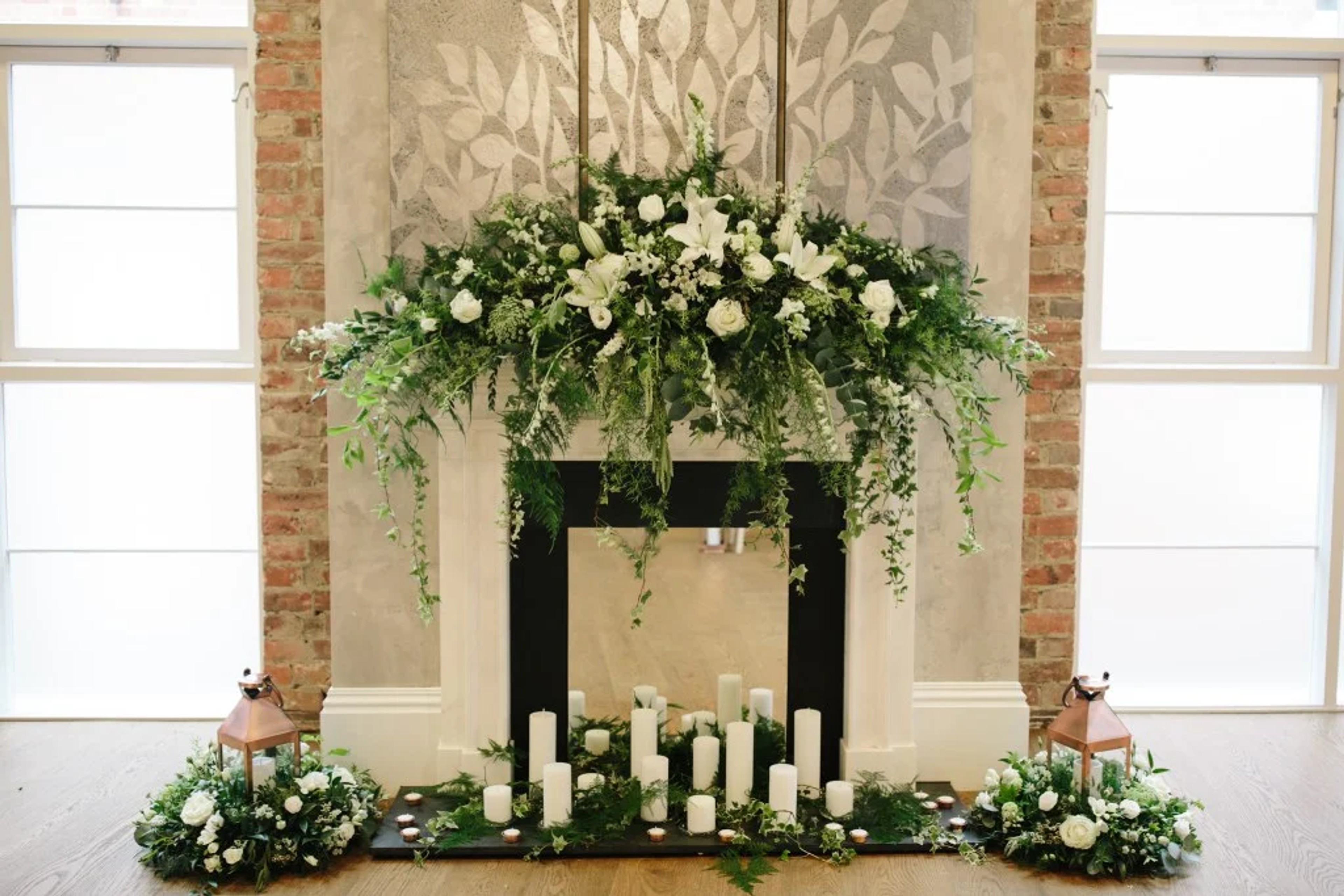 Wedding ceremony room adorned with beautiful floral arrangements