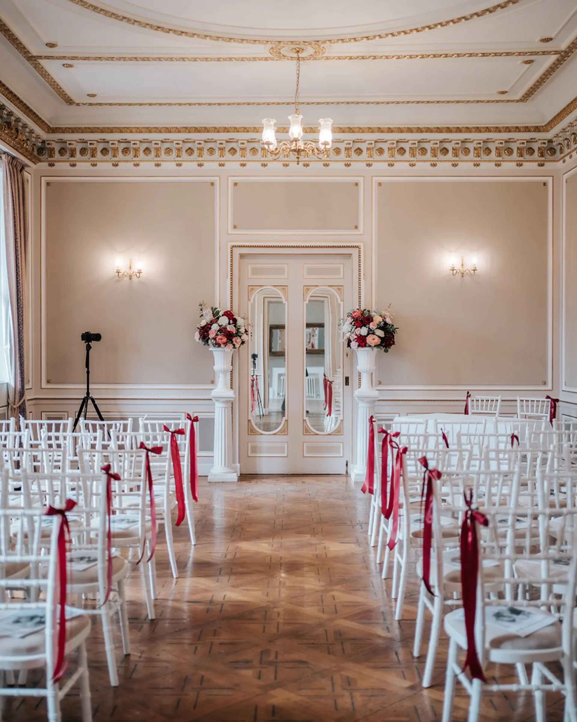 Wedding ceremony seating in an elegant Victorian room at Salomons Estate