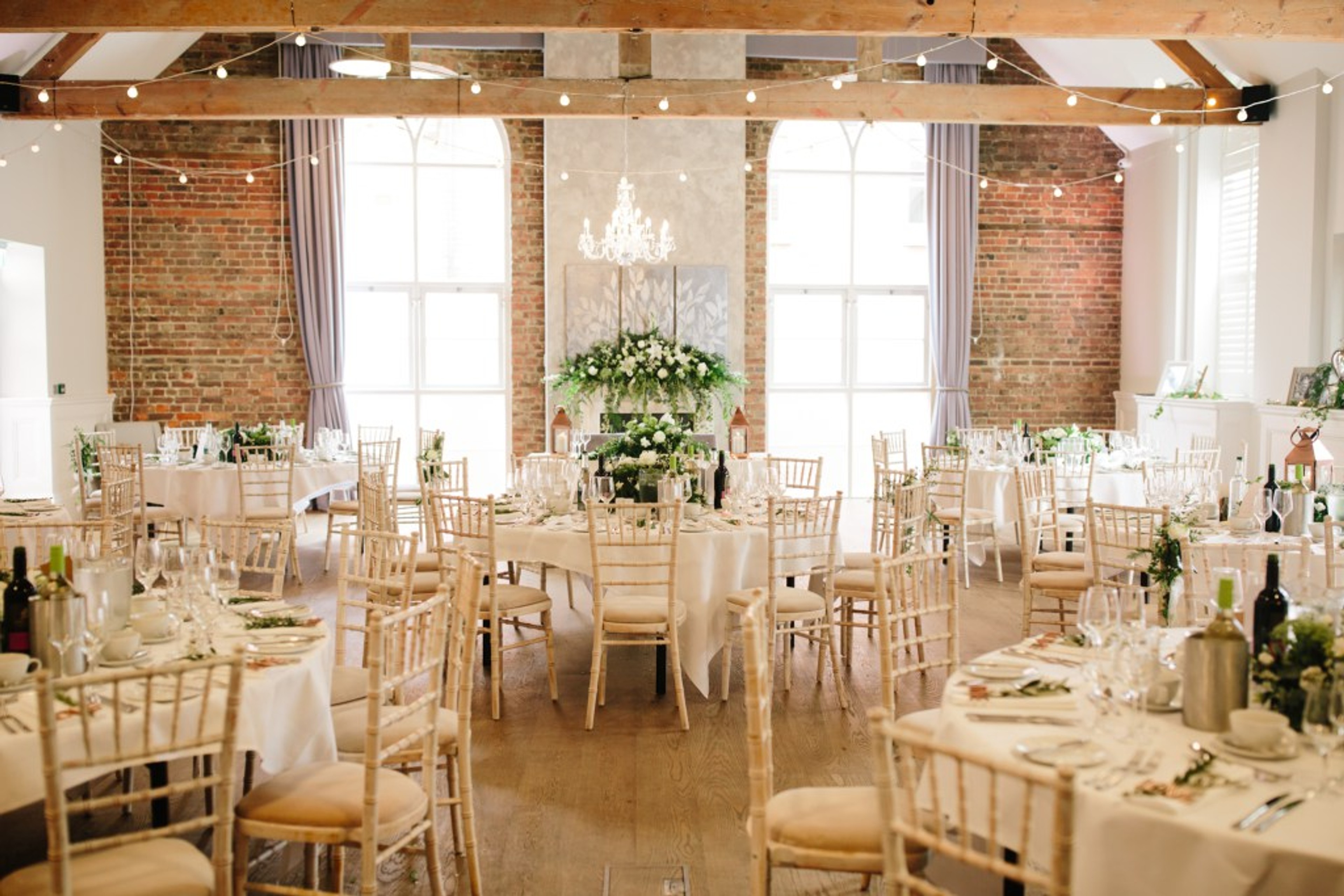 Wedding reception at One Warwick Park with elegant table settings