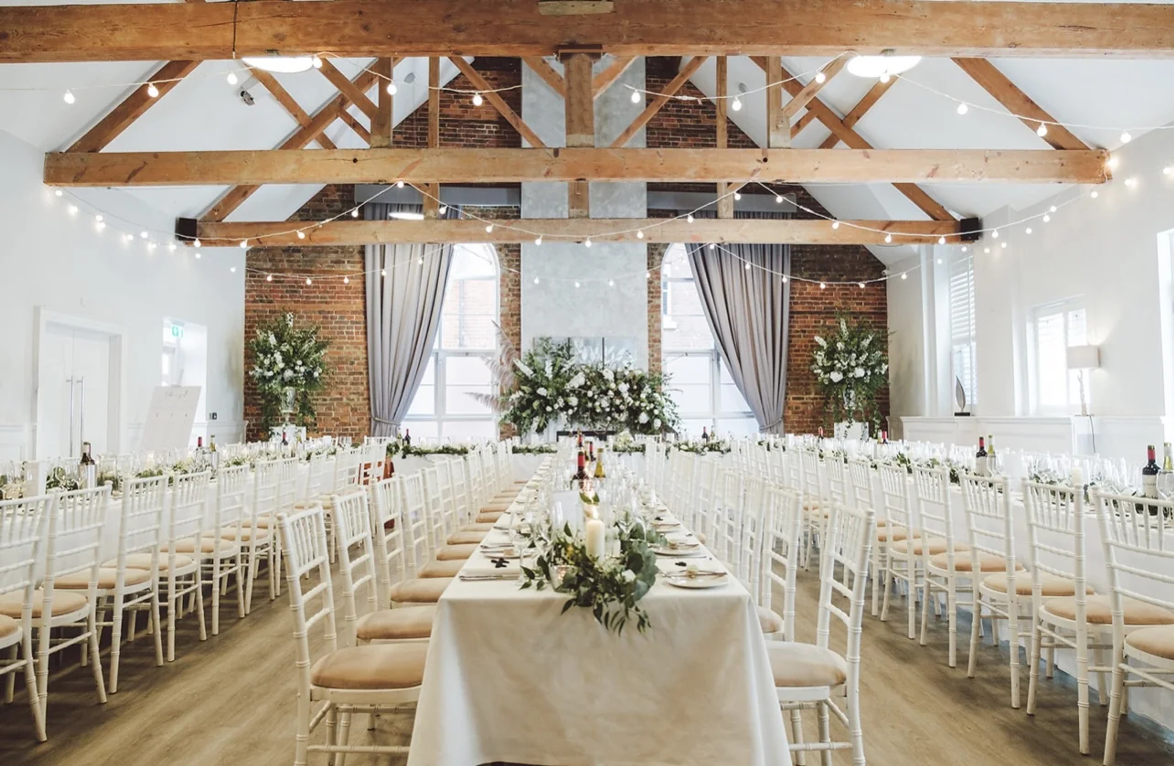 Wedding reception with long tables at One Warwick Park, Kent