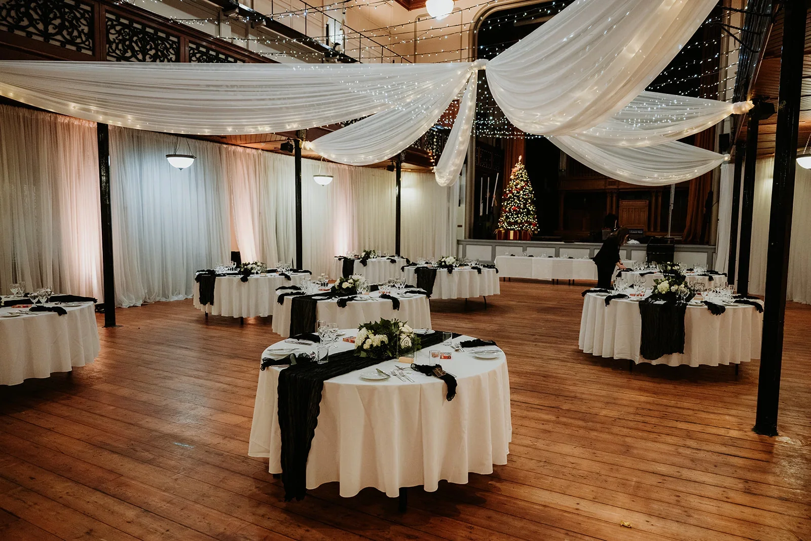The Theatre at Salomons Estate dressed for a winter wedding with fairy lights and white drapes