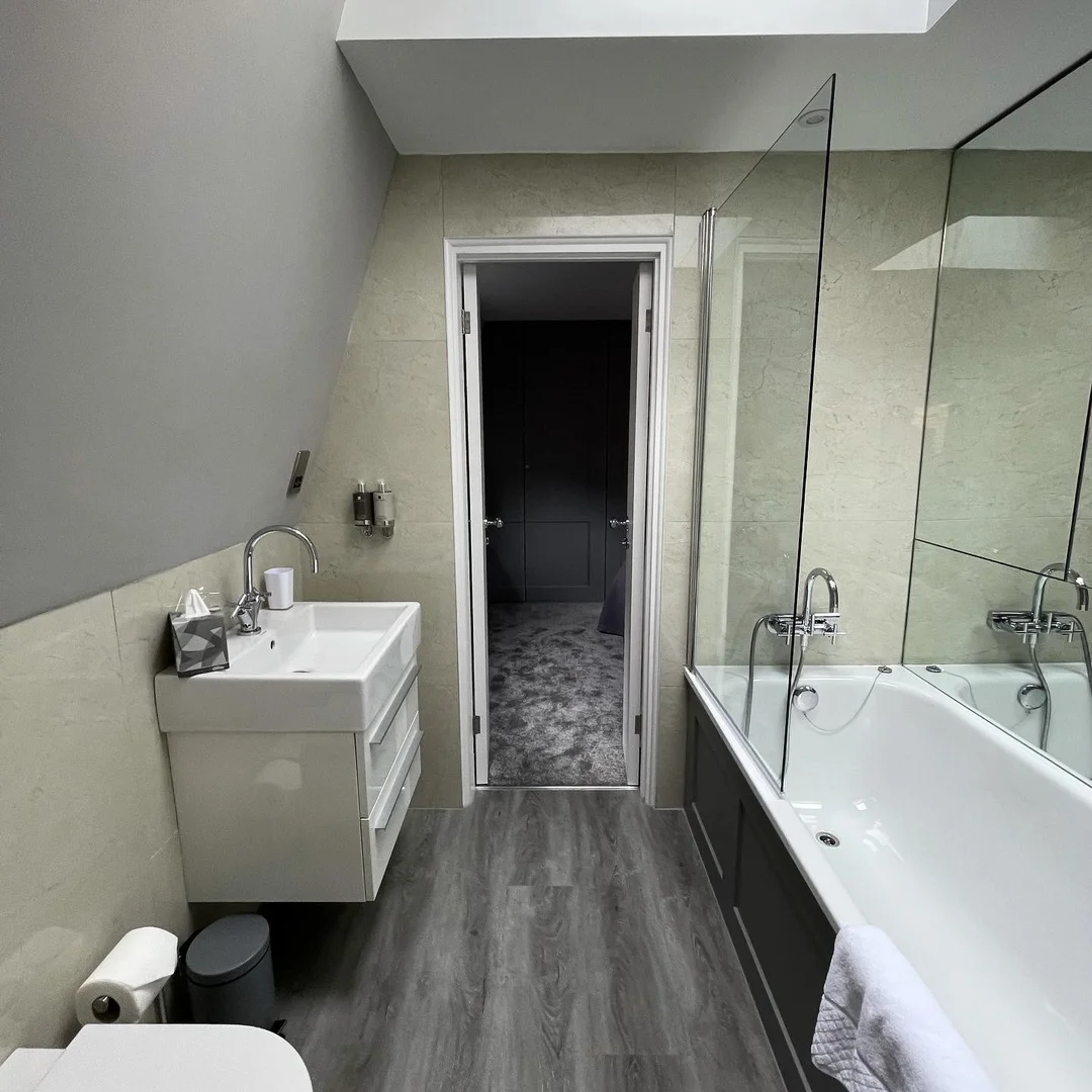 Elegant living space in The House with contemporary furnishings