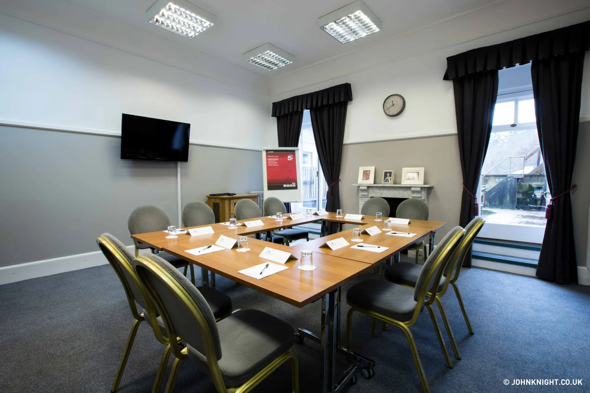 Boardroom meeting setup with branded stationery at Salomons Estate