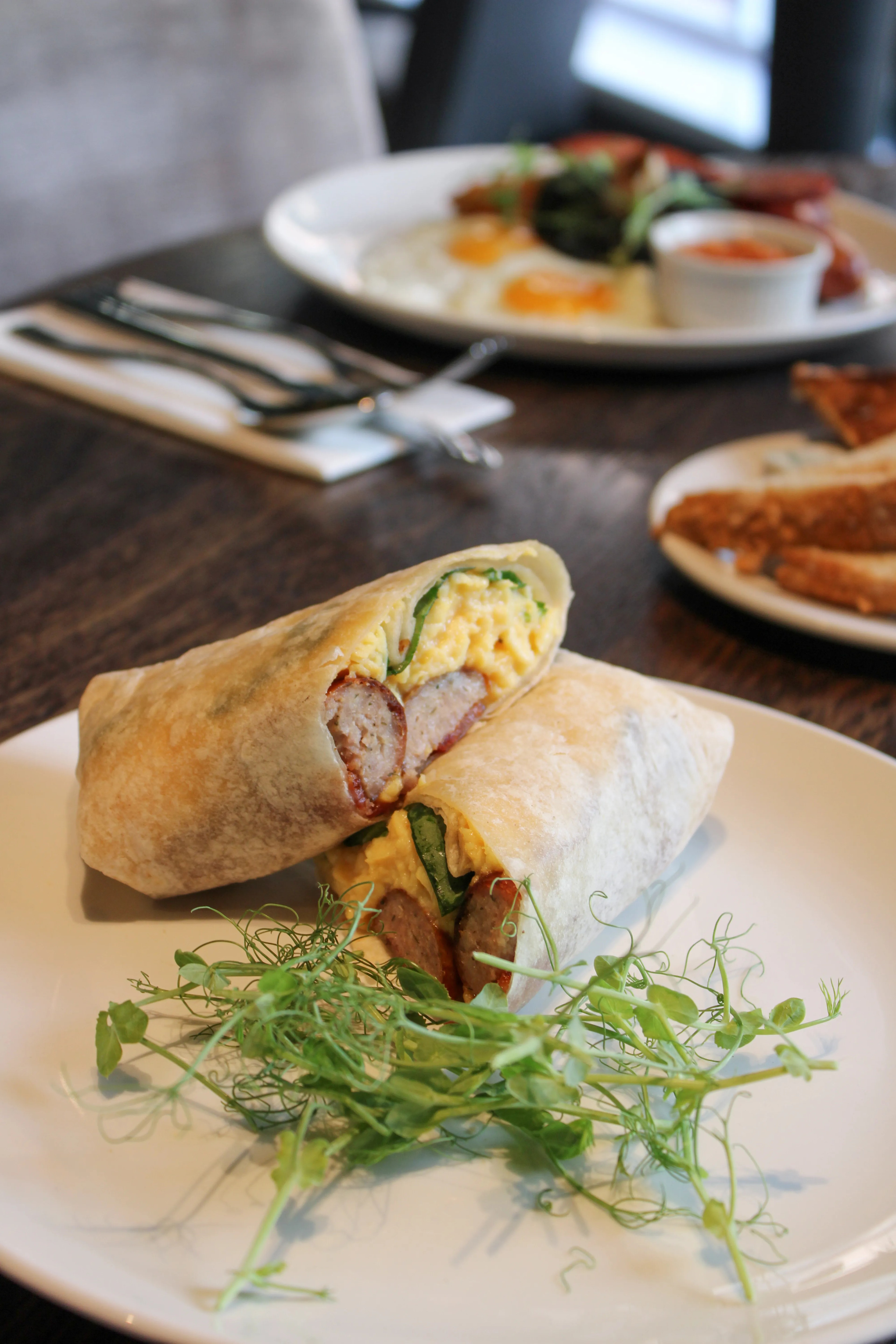 Fluffy pancakes with fresh berries at The Brasserie