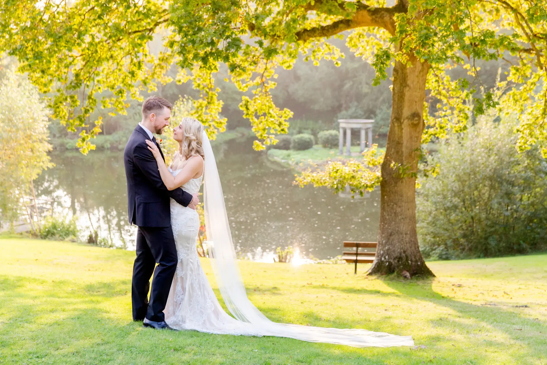 Couple's photographs by the lake at Salomons Estate