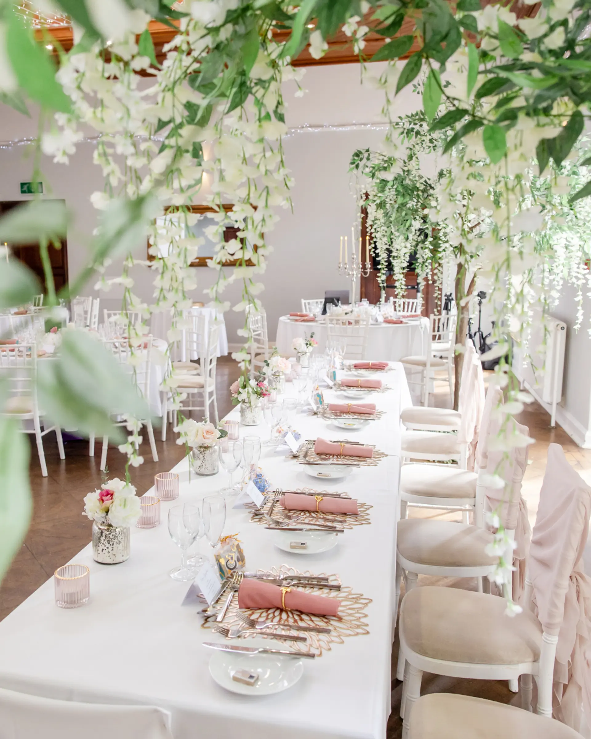 Floral wedding reception tables at Salomons Estate