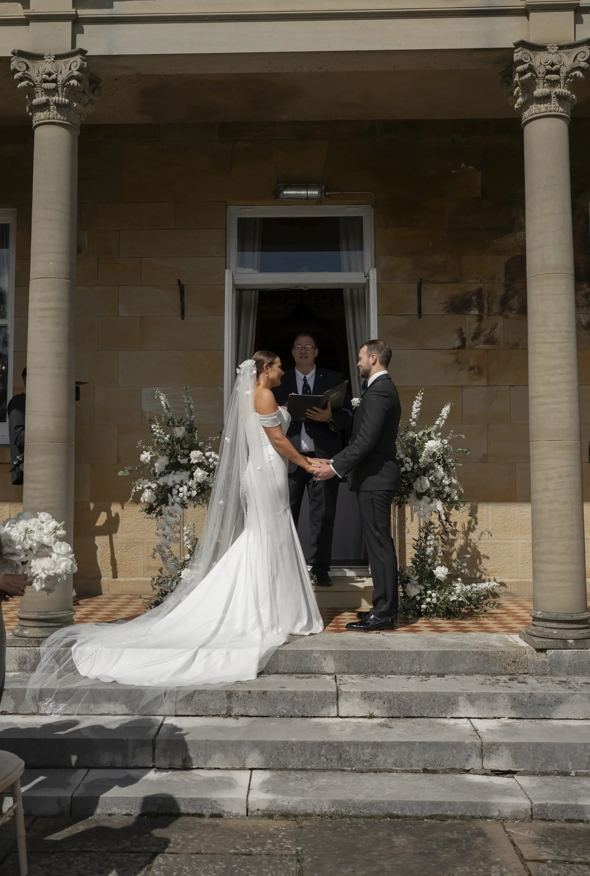 Chiavari chairs arranged on the lawn for a wedding ceremony