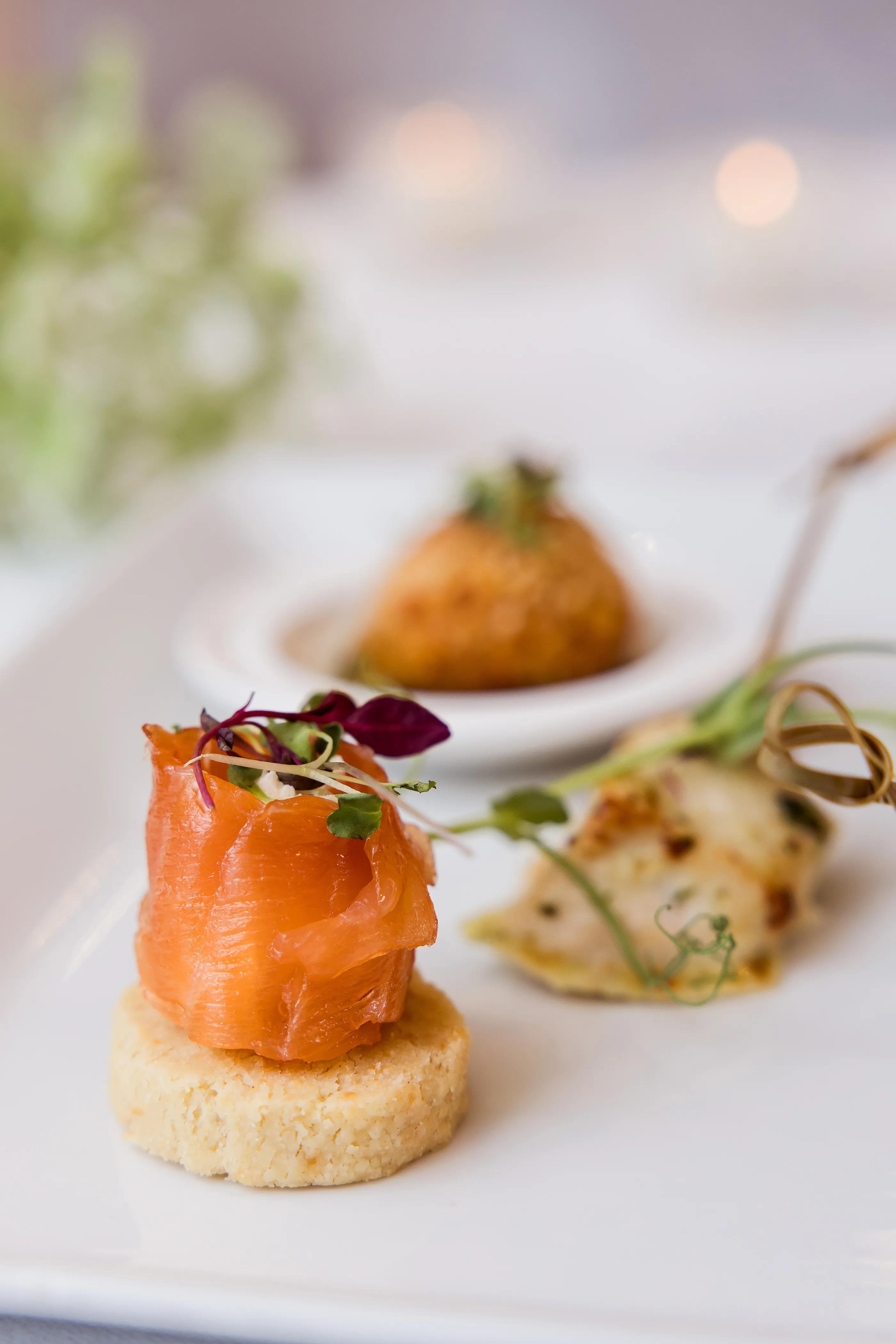 Elegant canapés with smoked salmon and micro herbs at Salomons Estate