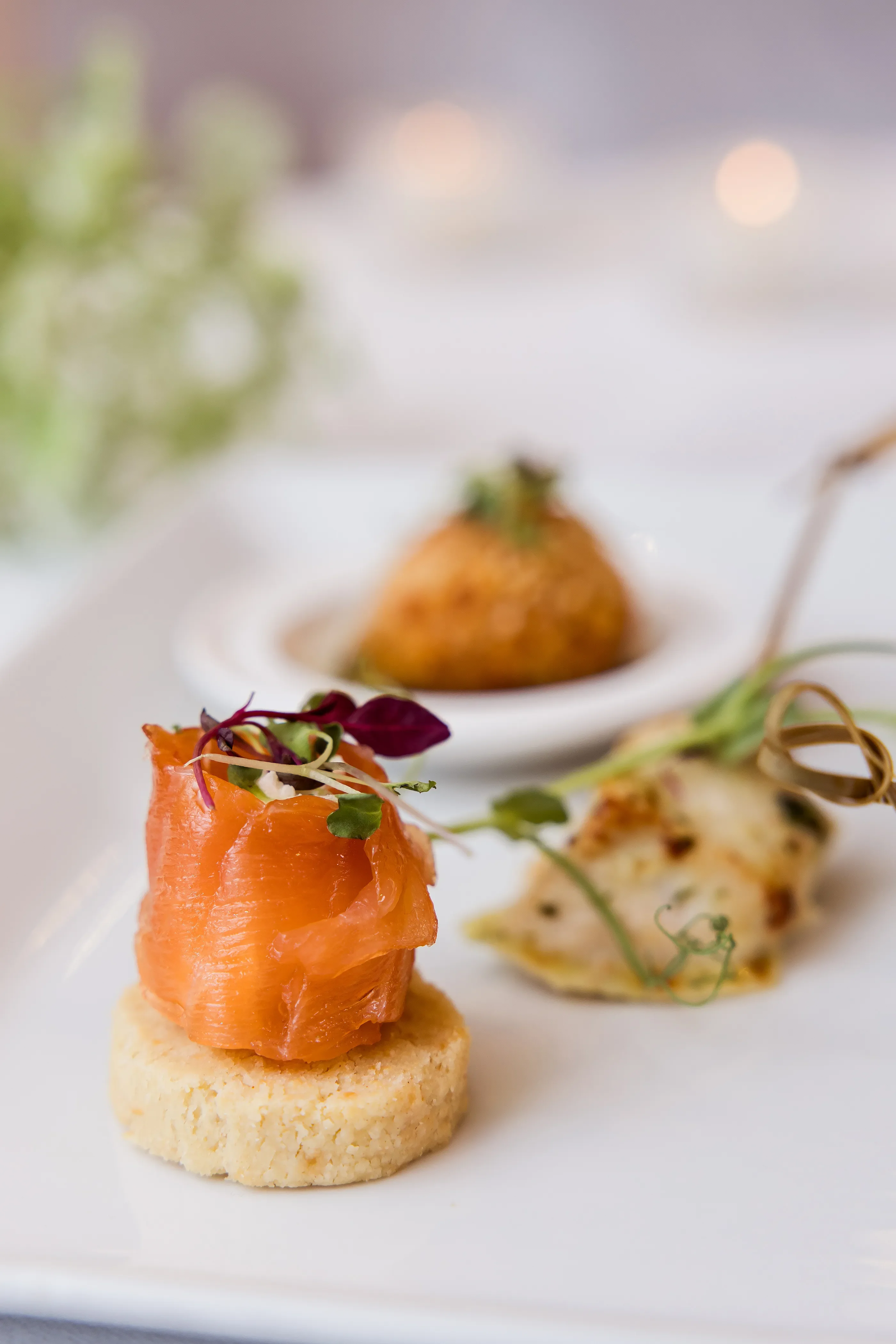 Elegant canapés with smoked salmon and micro herbs at Salomons Estate