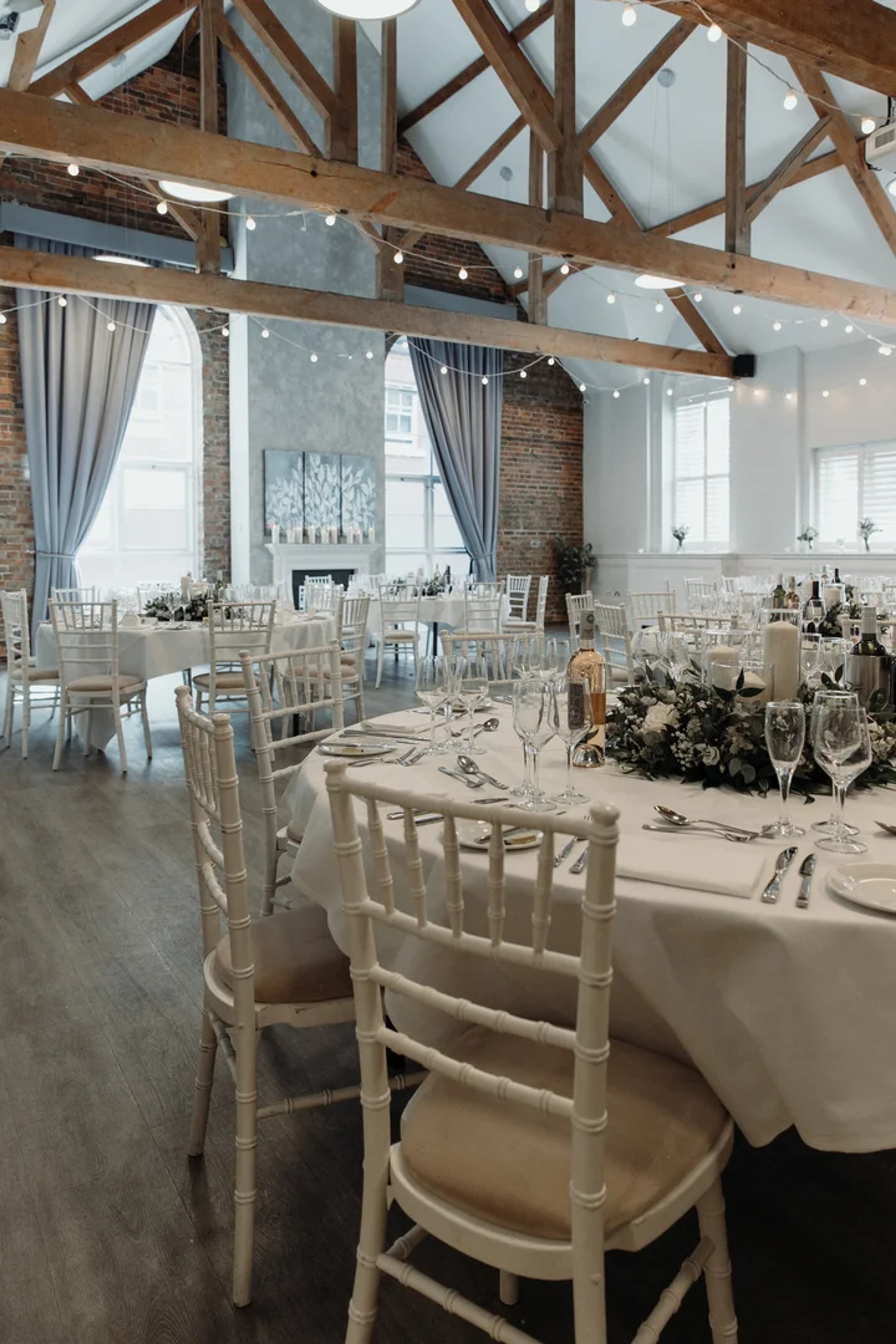 Beautifully dressed wedding reception table with centrepieces