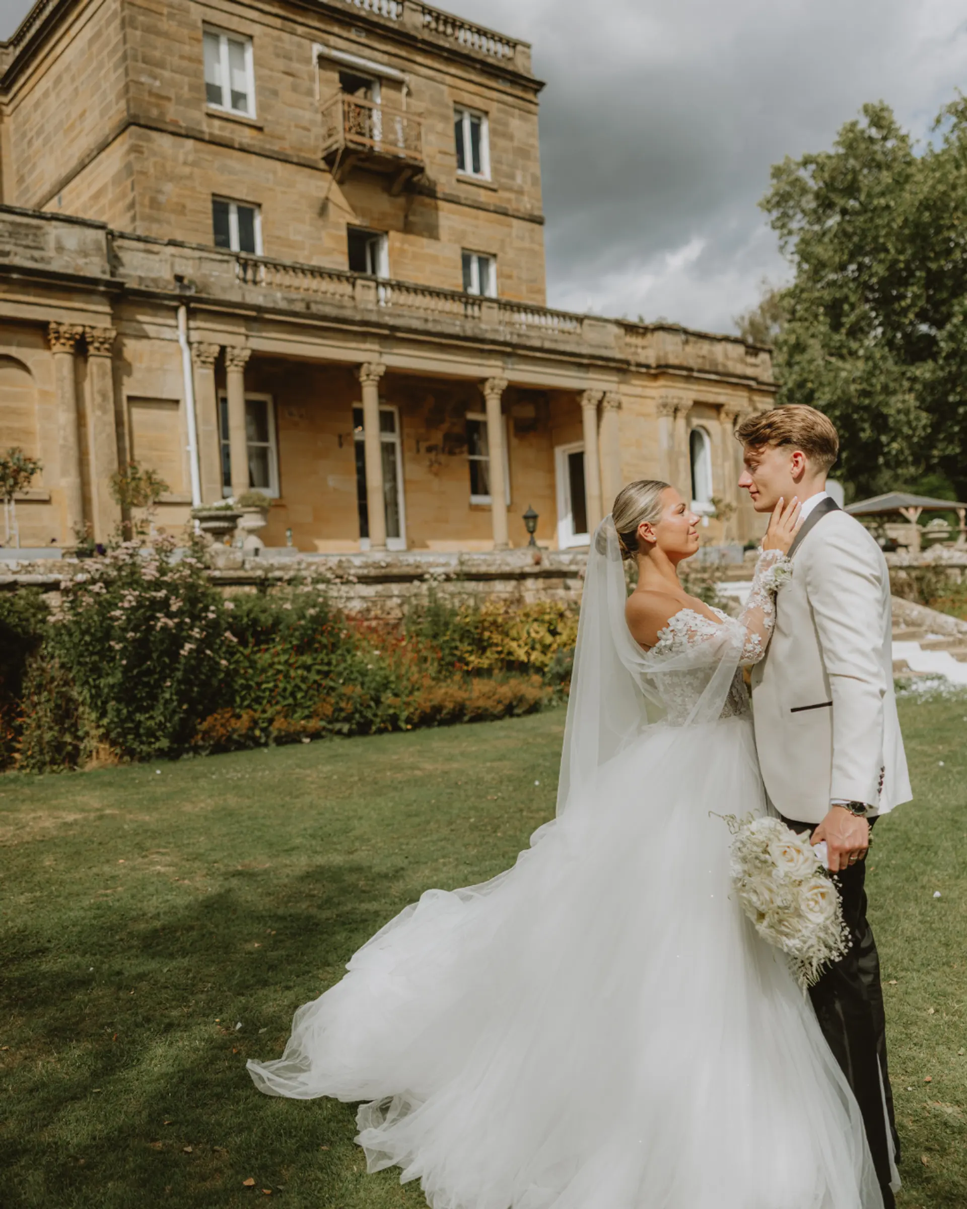 Bride and groom outside the Victorian manor house at Salomons Estate