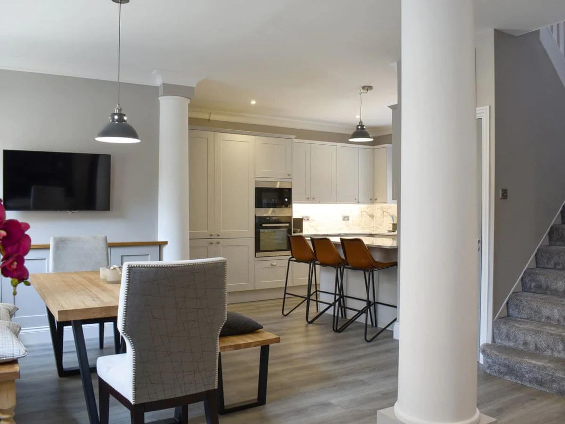 Beautiful open plan kitchen and dining area in The House at One Warwick Park