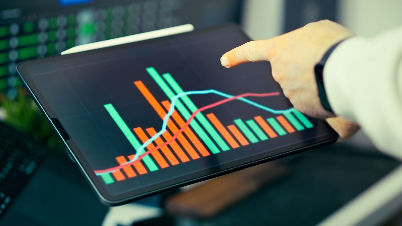 A person analyzing charts and graphs on a tablet representing AI model evaluation.