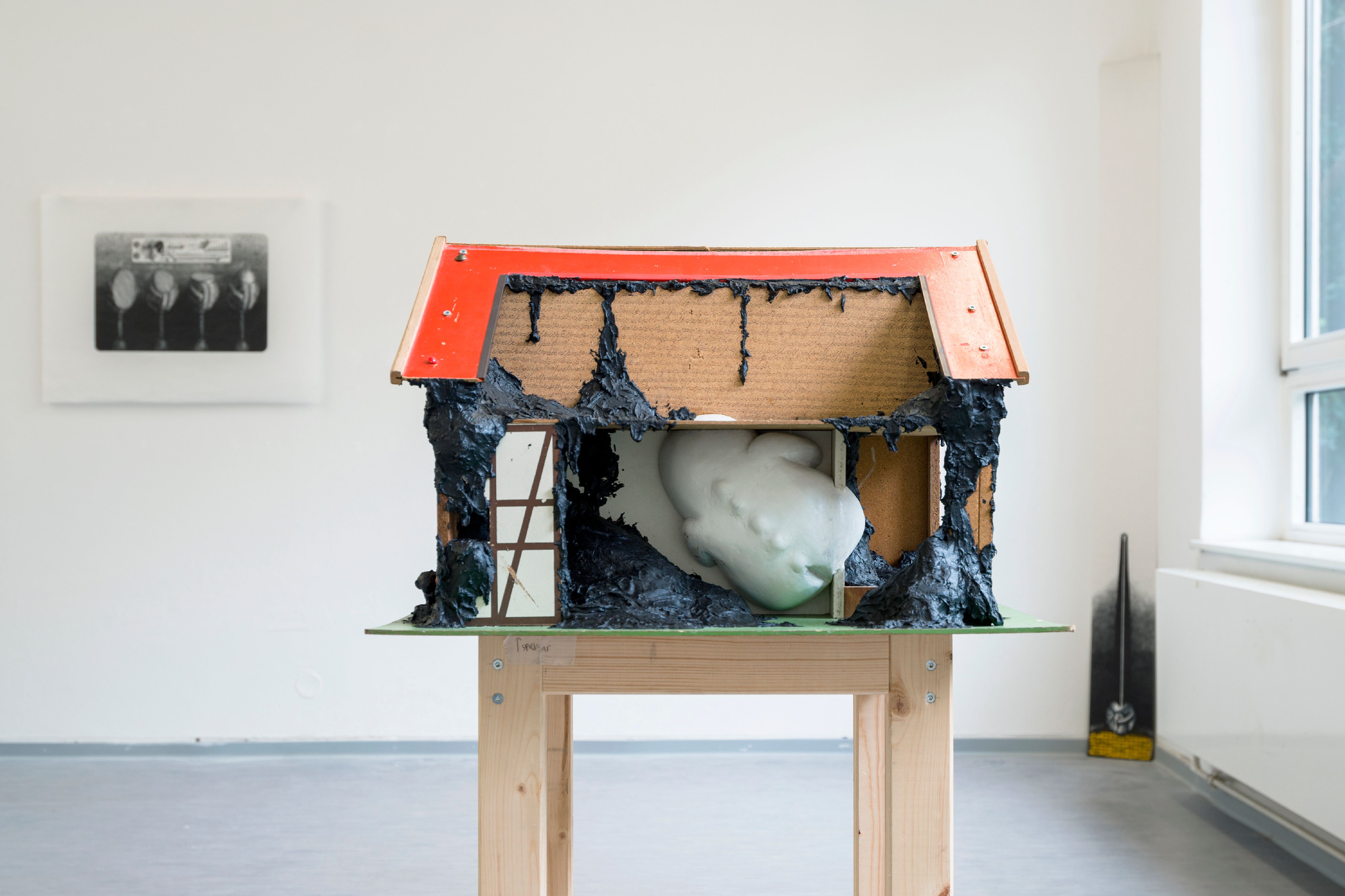 Elkin Salamanca, Palíndromo, 2022, Dollhouse, tar, carved egg 68 × 38 × 50 cm ×