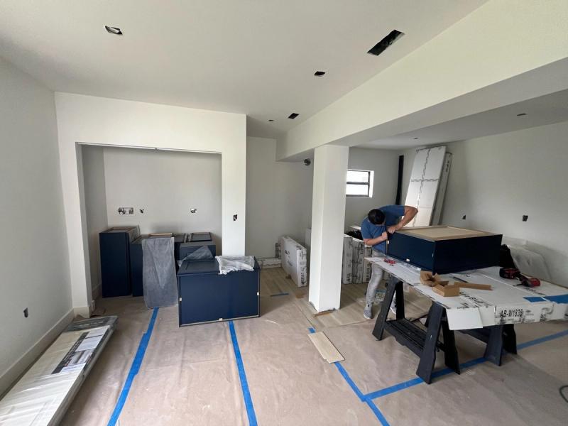Fire restoration project in Miramar, FL with new cabinets, structural repairs, and ongoing interior reconstruction.