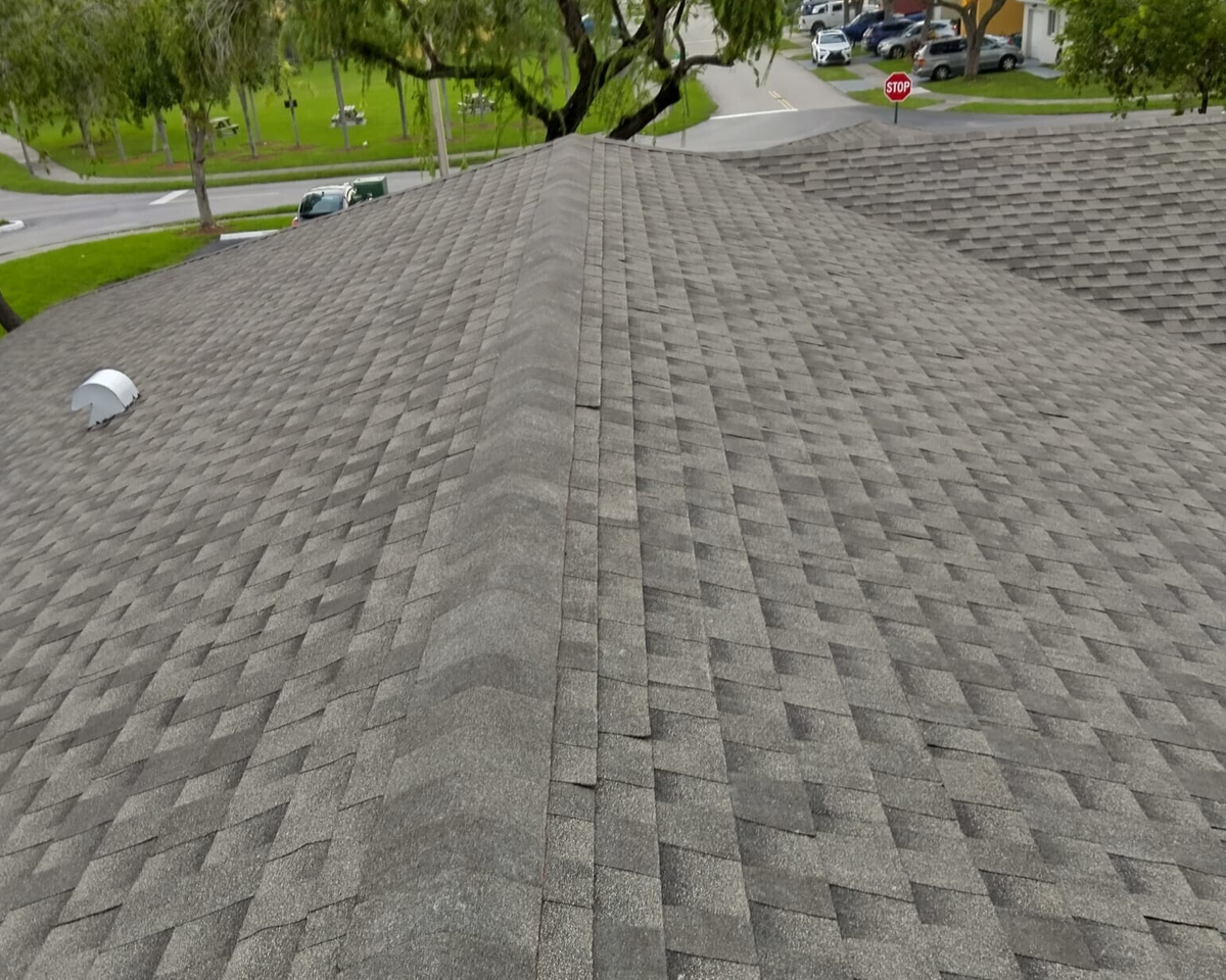 Completed roofing replacement project in Miami, FL, featuring sustainable materials and expert craftsmanship to restore protection and value across multifamily buildings.