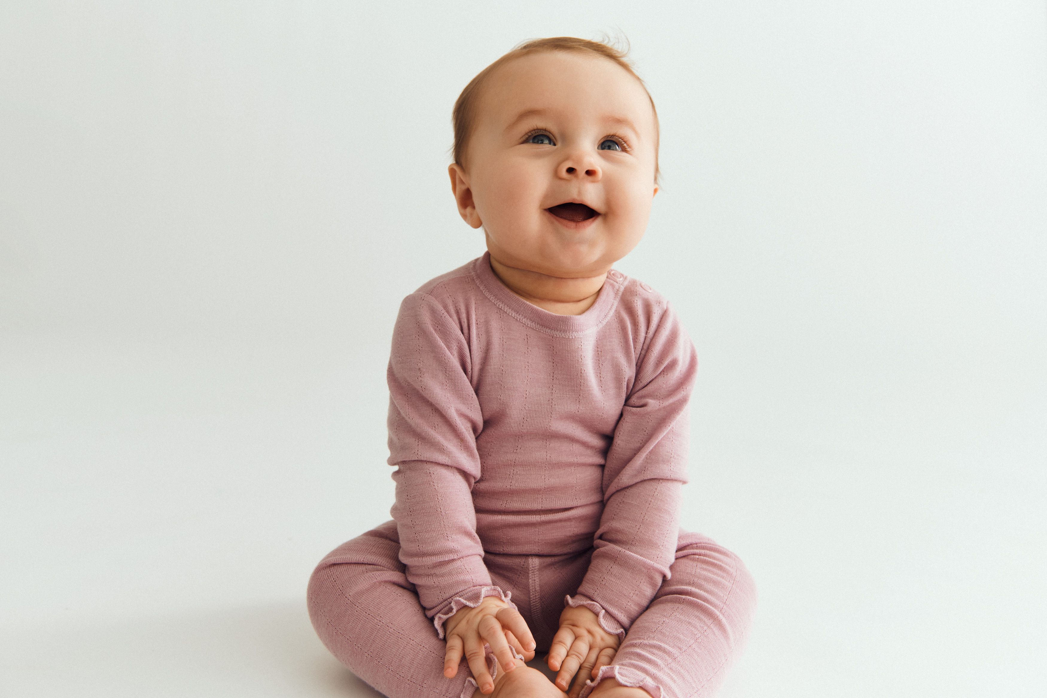Baby merino wool long sleeve bodysuit