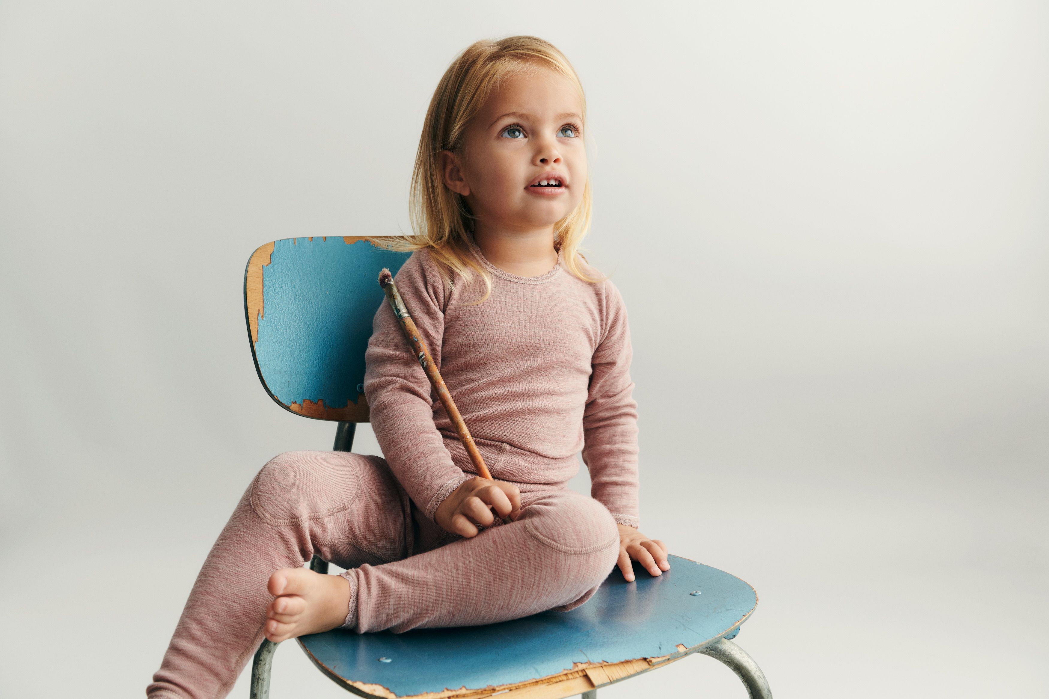 Toddler sitting on a chair