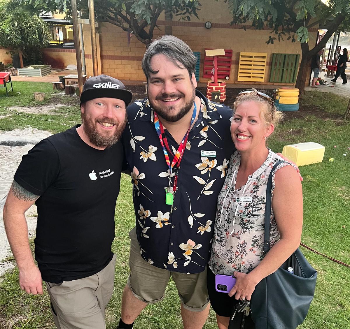 Three people standing