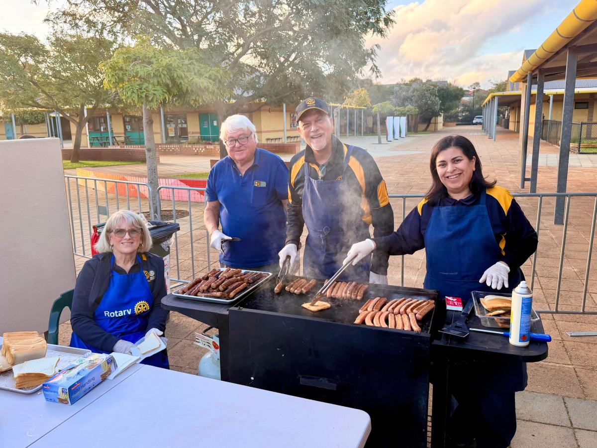 Members of the Rotary Club of Mindarie manning the barbeque