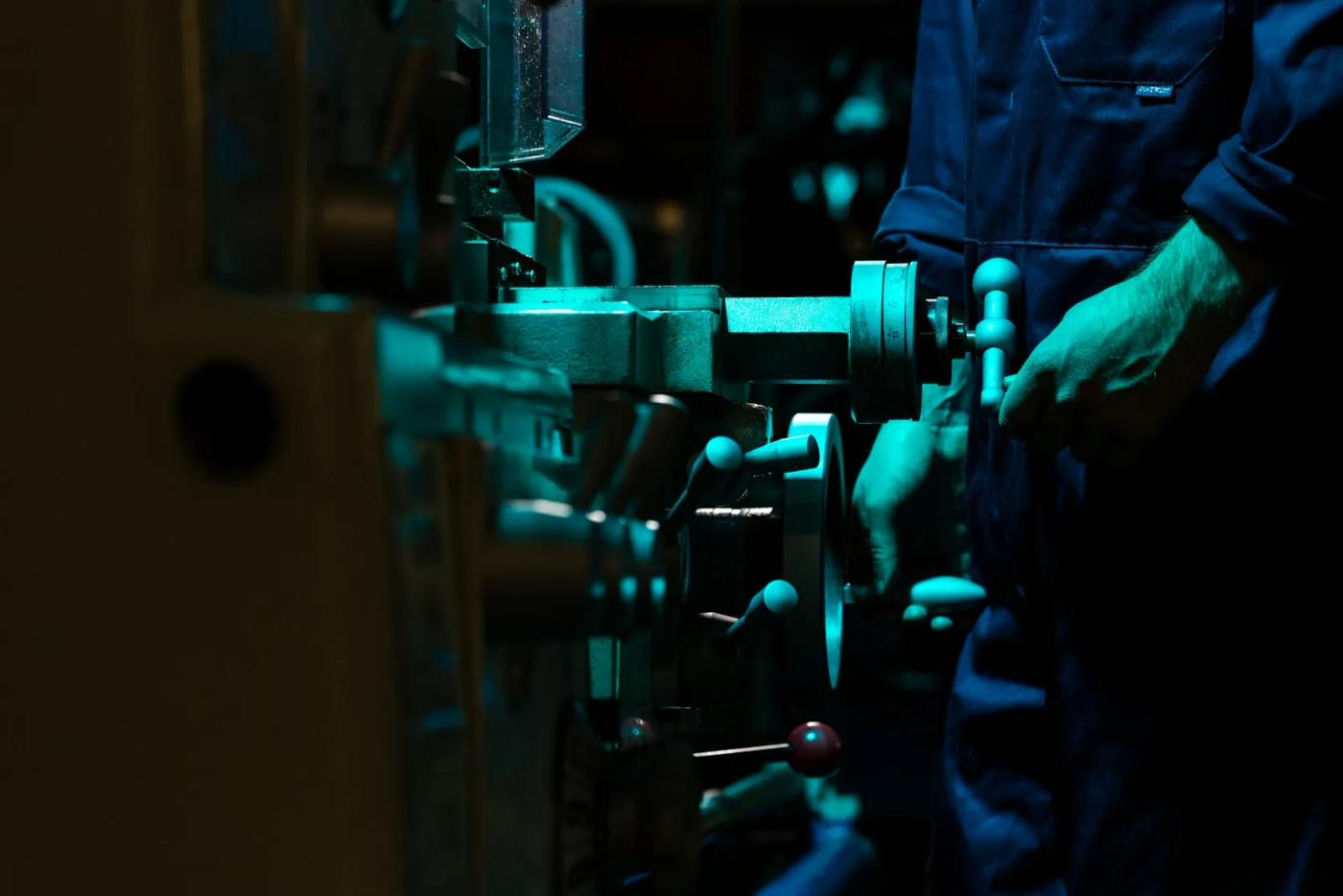 IPS technician performing precision machinery work