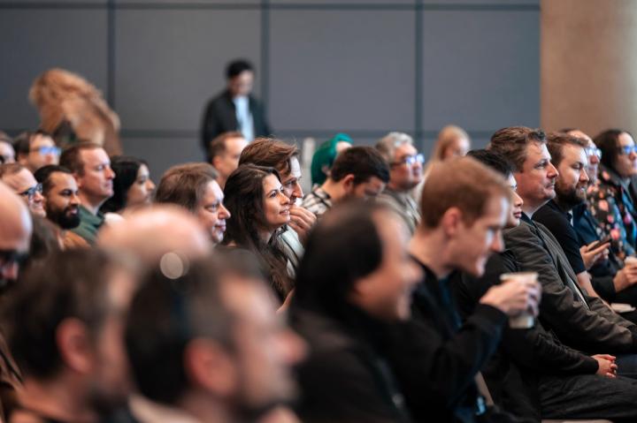 Attendees listening to a talk at Latency 2023