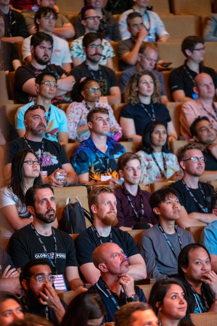 A tiered audience watching a talk at Latency 2021