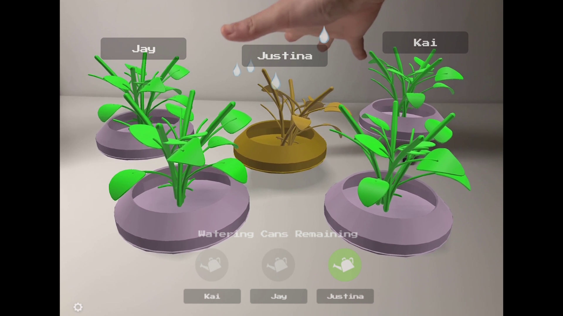 Mockup of hand gestures used to water AR plants.