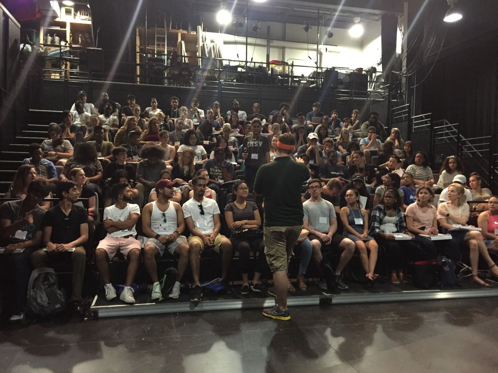 Teacher engaging a group of staff