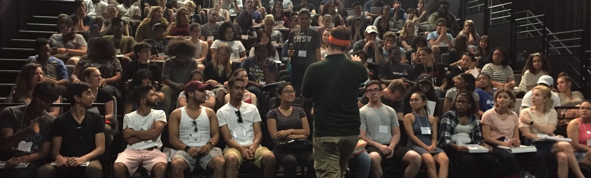 Teacher engaging a group of staff