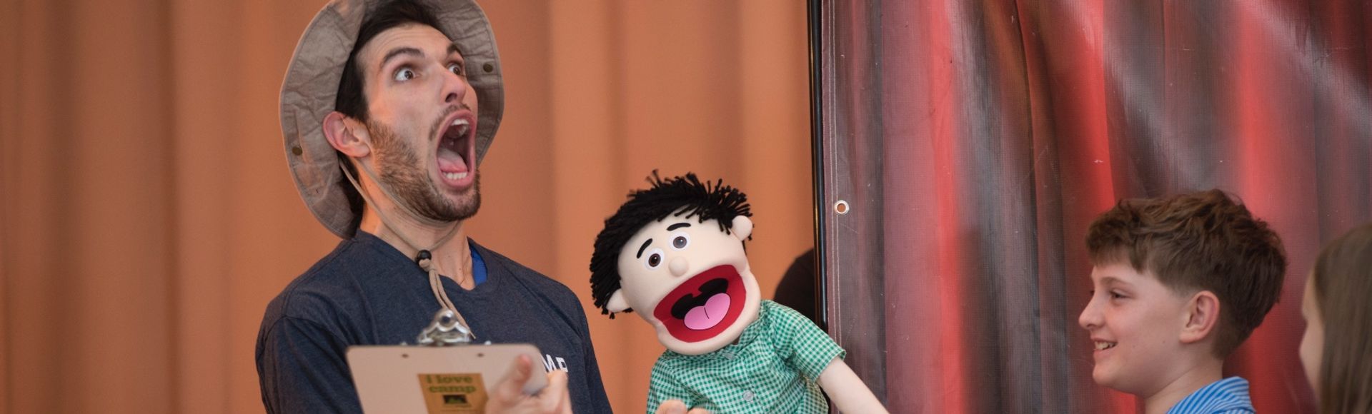 A puppet making someone laugh