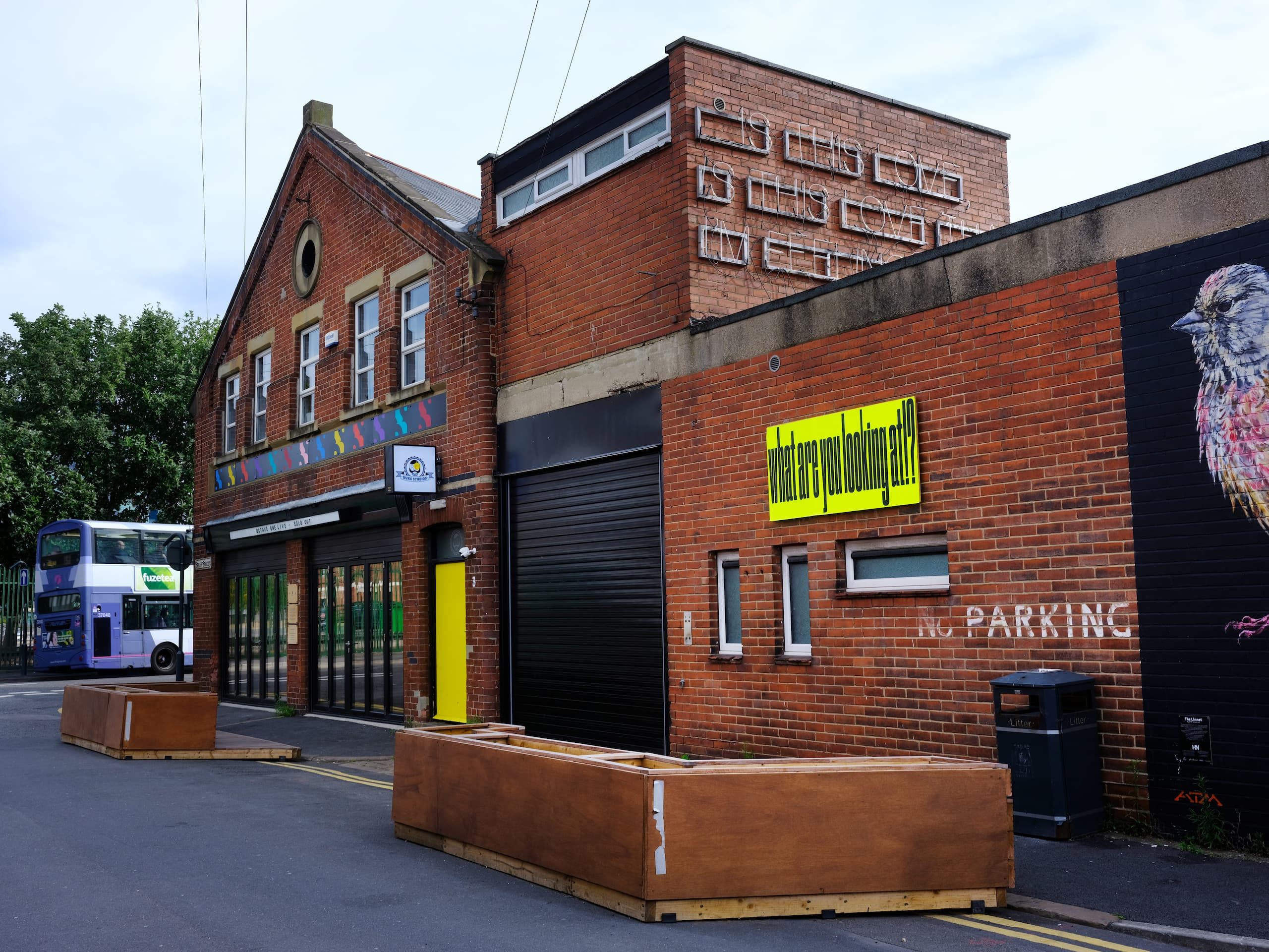 NoPARKING poster submission shown on the façade of Sheaf Street, Leeds.