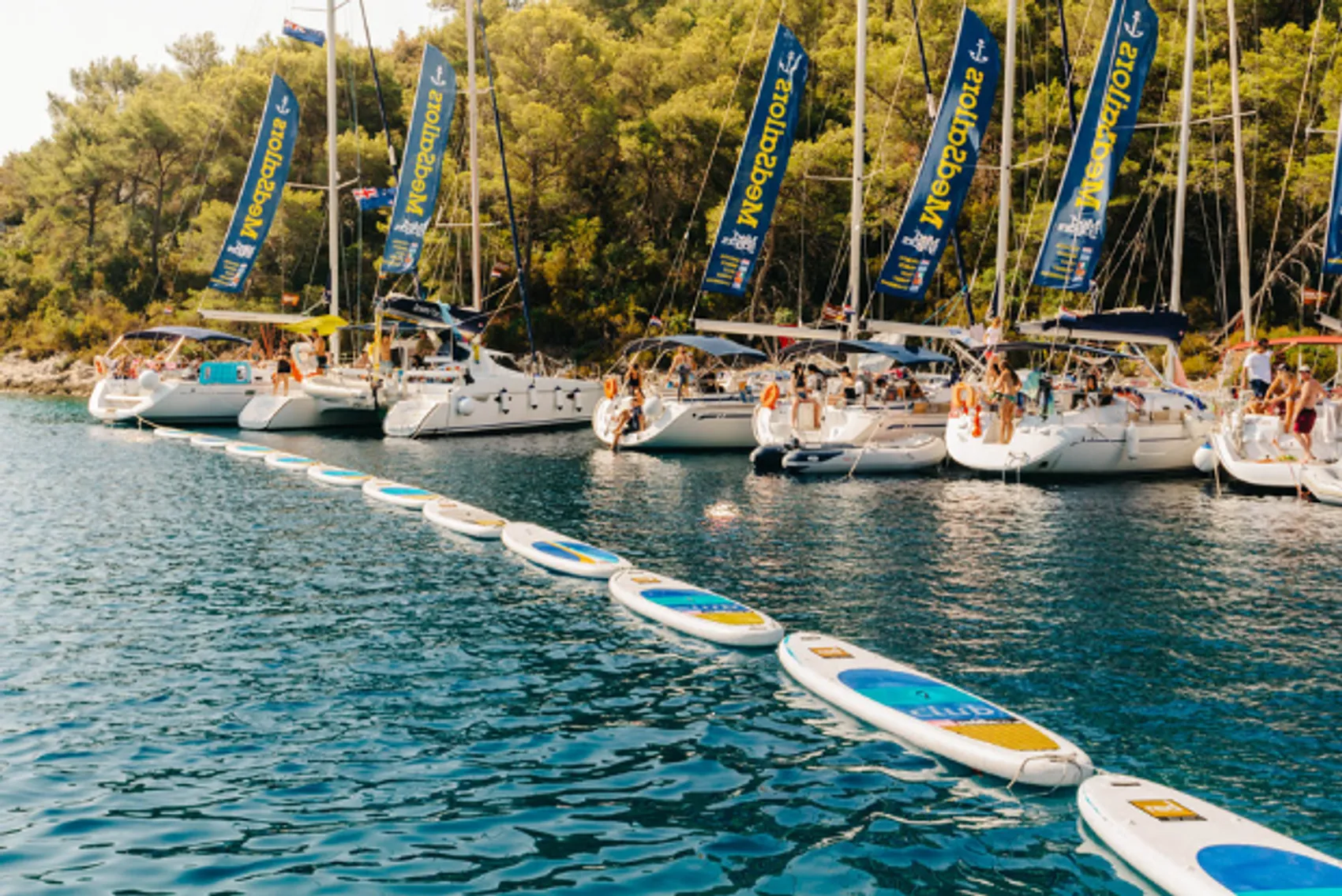 A raft of sailing yachts in a beautiful bay in Croatia.