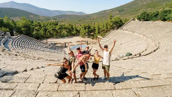 Group of friends at the amphitheatre of Epidavros