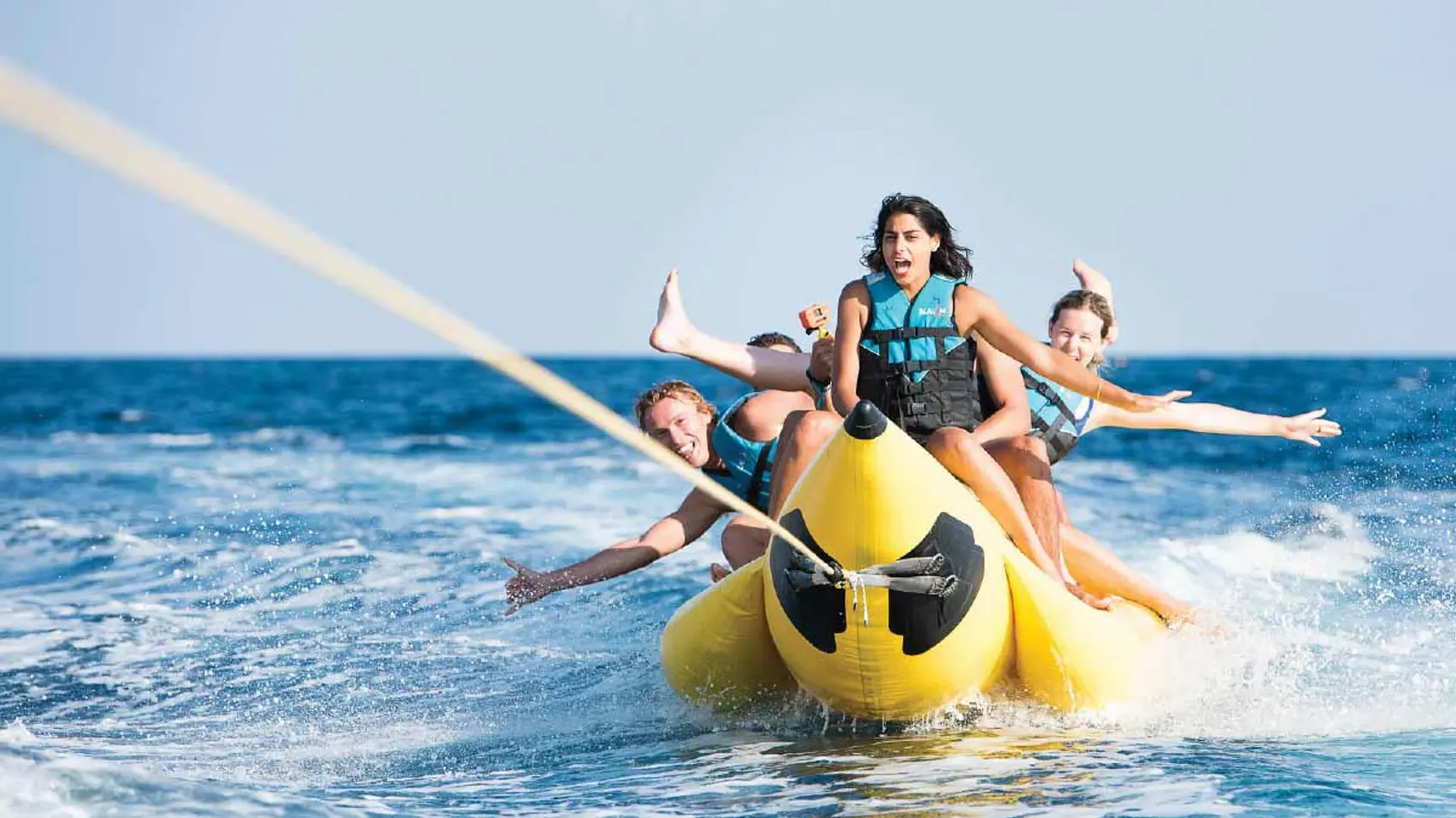 Group of people on a banana boat in Poros