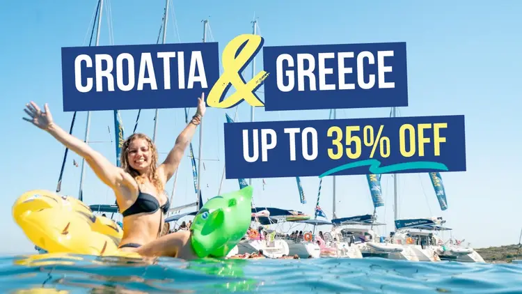 Woman on a floatie in front of some yachts