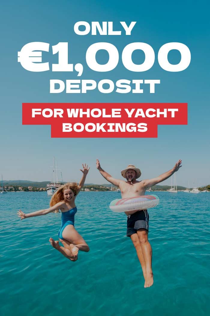 People jumping off a yacht