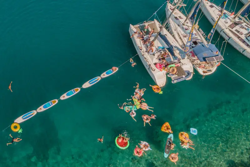 flotilla line up with floaties and paddle boards