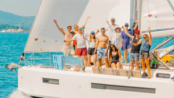 MedSailors guests wave for a photo