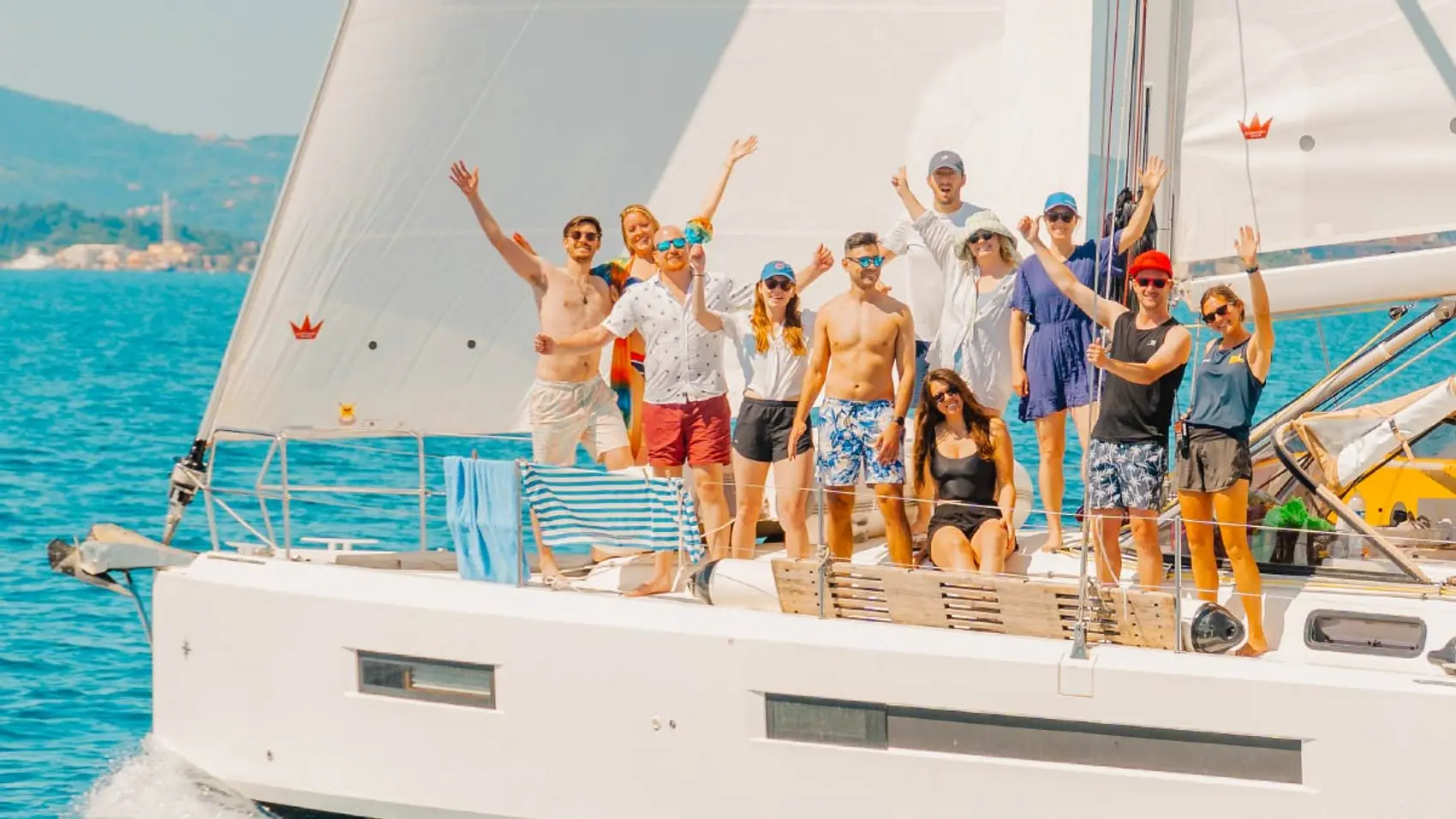 MedSailors guests wave for a photo