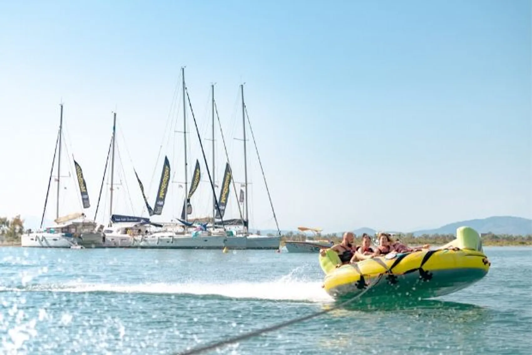 MedSailors guests riding the crazy sofa in Greece