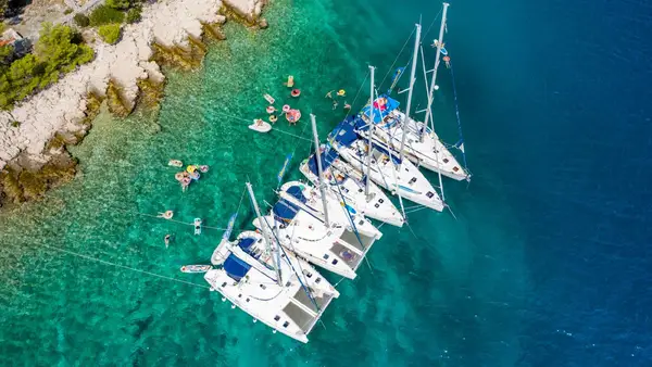 MedSailors yachts rafted together in a bay in Greece